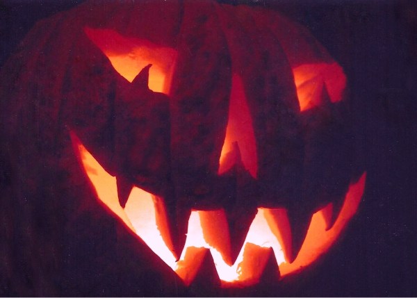 I scanned this very old photograph of a long-ago jack-o-lantern I carved for the boys.