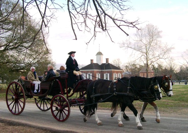 William Durant preferred carriages, but took another road and changed history. Visitors enjoy a December evening at Colonial Williamsburg, 2004
