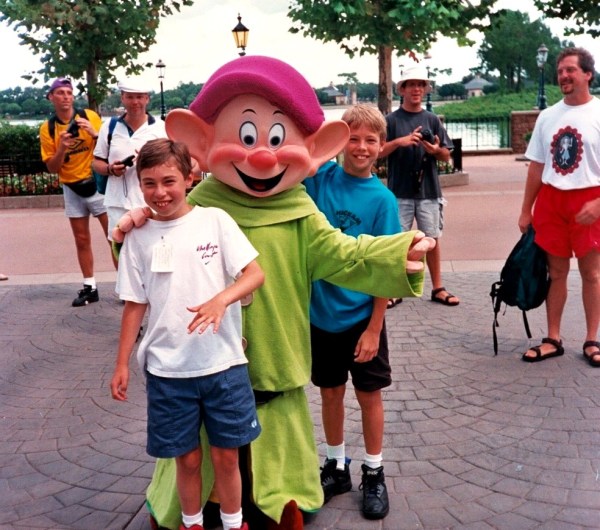 We might call him Dopey, but at least he's getting paid to be there. And he's not waiting in any lines, either.  Disney World, summer 1995