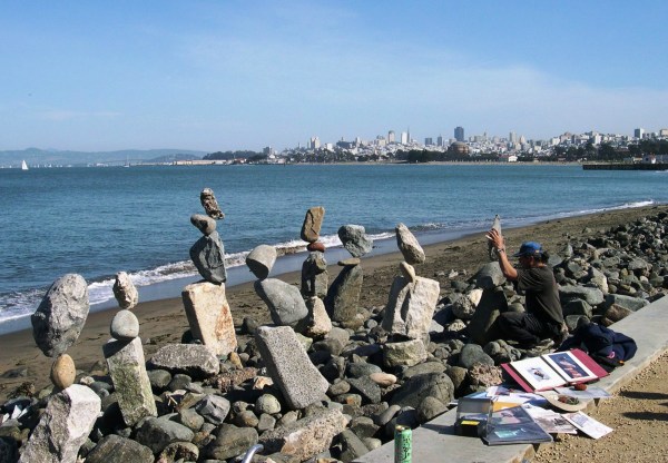 This man had as much fun balancing rocks as we had watching him! San Francisco, February 2003