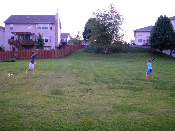 Drew and Kevin make the most of a beautiful July evening. O'Fallon, Illinois, 2004