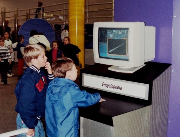 Drew and Matt explore a computer encyclopedia at Science World, Vancouver, BC, 1993