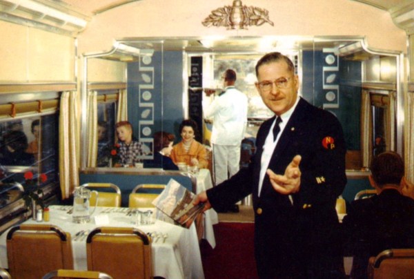 The past beckons, but we can't go there except in our imaginations. The dining car of the Northern Pacific Railway North Coast Limited Image licensed under Public domain via Wikimedia Commons
