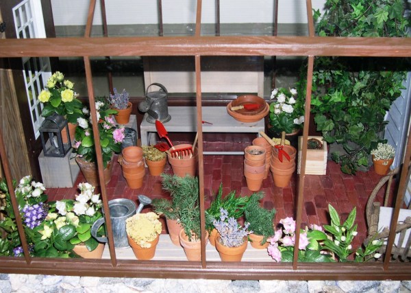 I got so excited about this greenhouse in the Tasha Tudor dollhouse that I took several photos of it. Colonial Williamsburg, Virginia, December 2004