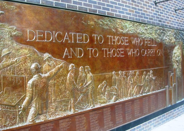  I photographed this memorial wall at FDNY Engine 10 Ladder 10,  directly across from Ground Zero, May 2007.