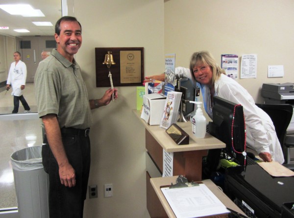 Jeff participates in the traditional ritual of "ringing out" on his last day of radiation at Walter Reed, September 2013.