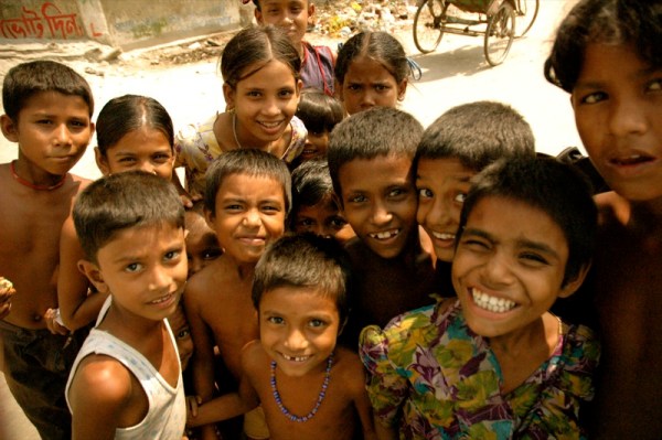 Crowd of smiling children in Bangladesh, via Wikimedia Commons