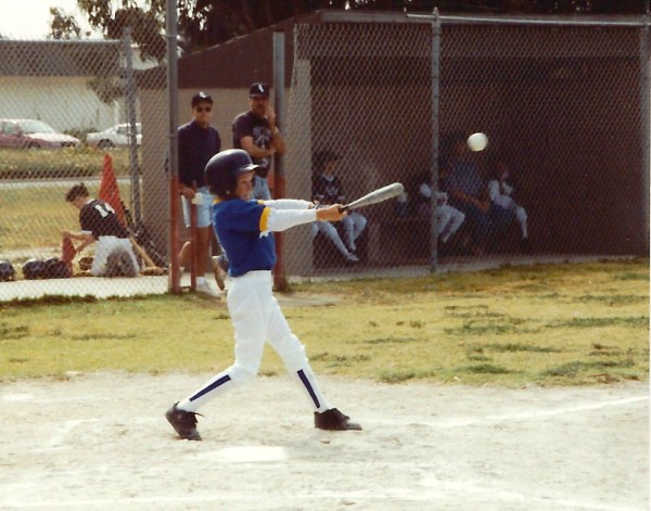 Eight-year-old Drew, during his first year of playing baseball. He hit a lot more triples than homeruns -- no wonder I like triples!