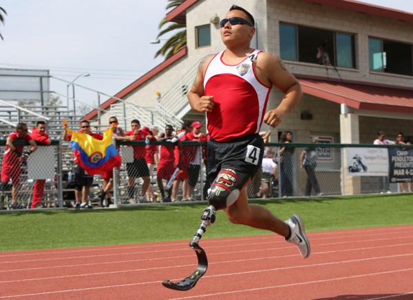 Not passive: Cpl. Marcus Chischilly's patient training pays off at the 2014 Marine Corps Trials, Camp Pendleton, California. Public domain photo by Lance Cpl. John Baker via Wikimedia Commons