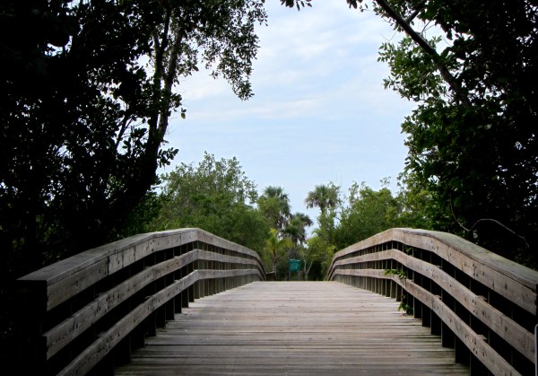 This bridge on Captiva Island, Florida, led through lush green paths to the sea. January, 2013