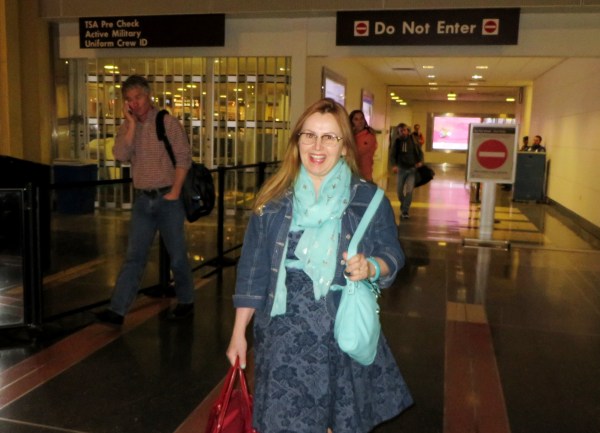 Still smiling after an arduous journey, Boomdee arrives at Reagan Airport, March 2016.